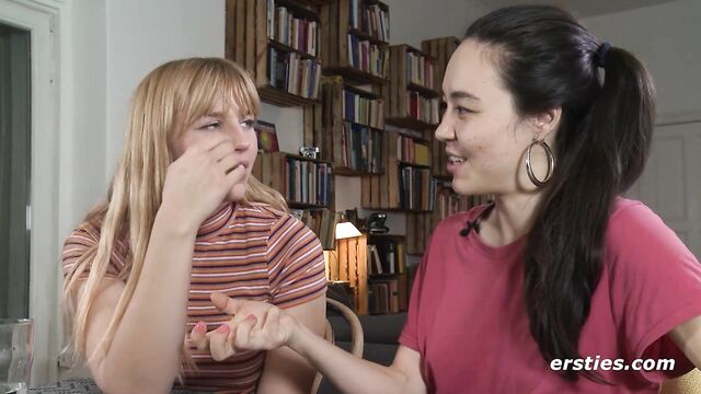 One guides the other's face exactly to the right spot