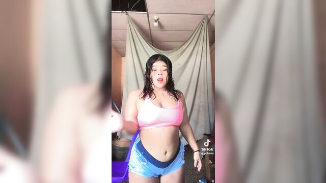A young girl moves her tits and ass to get male approval