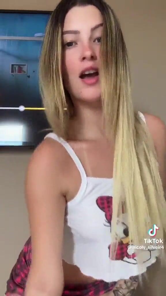 A super hot girl dancing Brazilian funk with no panties and a short skirt