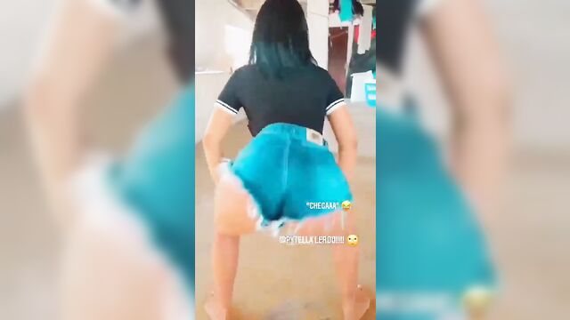 Hot brunette woman plays with her pussy and shows off her ass in shorts