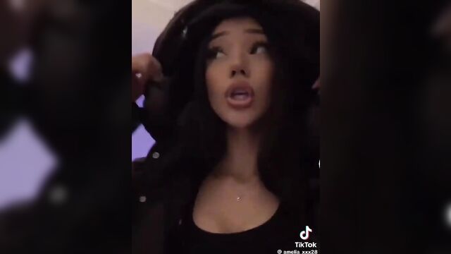 A beautiful girl with big tits performs a viral tiktok dance