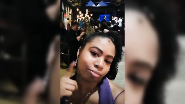 Sexy girl in a purple dress does not know what to do with her life