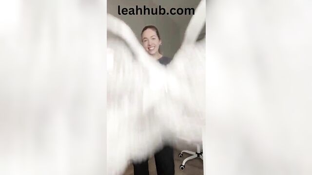 A blonde woman with big boobs gets very excited in this video