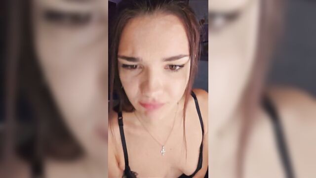 A super hot babe is performing a sexy striptease on a webcam live show!