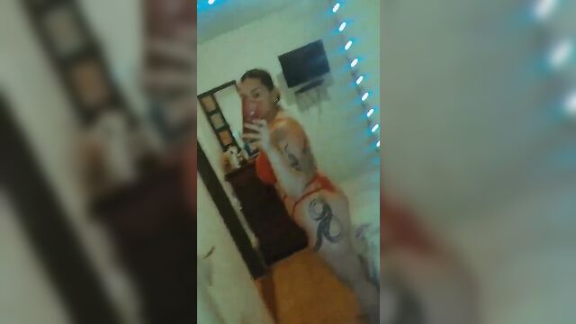 A fat woman named nati shows her ass and shakes it during a sexy dance