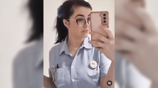 A busty nurse gets her tits out and fucks like a slut on camera