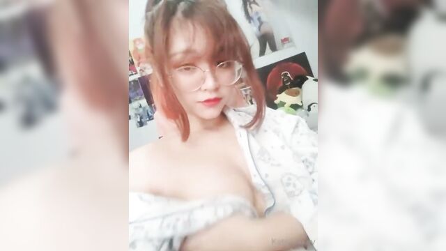 The cute girl shows her new onesie on onlyfans