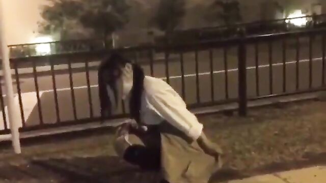Asian girl caught peeing on the street and gets punished